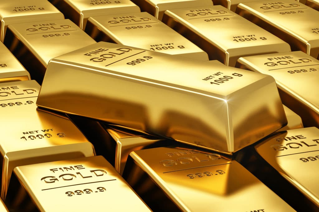 An image of stacks of gold bars.