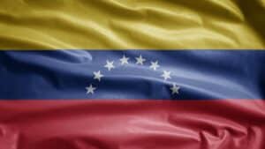 Venezuelan flag waving on wind. Venezuela banner blowing soft silk.