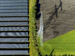 aerial view of solar panels by a green field and p 2024 03 01 02 37 26 utc